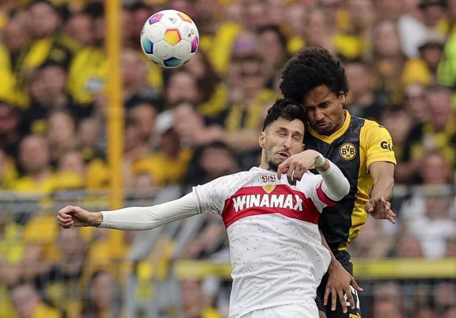 Truc tiep bong da Trận hòa 0-1 làm gián đoạn cuộc chiến top 4. Dortmund bất ngờ sa sút, chấm dứt chuỗi 5 trận toàn thắng của họ.